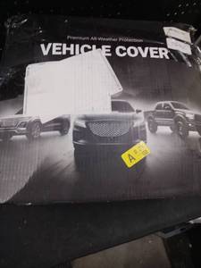 lot 5617 image: iCarCover Premium 30-Layer All-Weather Vehicle Cover Size T70 - Retail $110