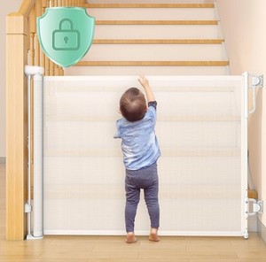 lot 5600 image: Momcozy Auto-Locking Retractable Baby Gate - Retail $68