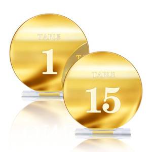 lot 6334 image: HZGUEOSTB Acrylic Wedding Table Numbers 1-15 with Stands,4.8Round Mirror Gold Table Number Signs and Holders for Wedding Reception, Party, Event, Centerpiece Decoration (Gold, 1-15) - Retail $29in