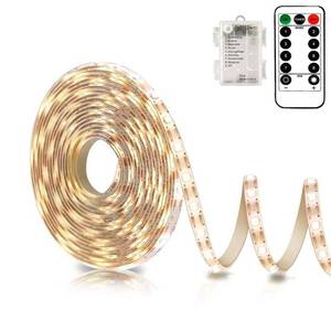 lot 4411 image: echosari Battery Powered Led Strip Lights with Remote Warm White, 8 Modes, Dimmable, Timer, Self-Adhesive, Cuttable, Waterproof, 9.8FT 90Led Strip Lights for TV Kitchen Cupboard Bedroom Decor - Retail $10
