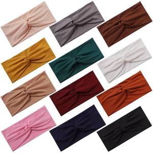 lot 2146 image: Panleding 12 Pcs Stretchy Headbands for Women, Absorbed Sport Headband Soft Twist Knotted Headbands for Daily Life Yoga Workout - Retail $10