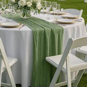 lot 4282 image: 10FT Sage Green Cheesecloth Table Runner � 120 Inch Gauze Table Decor for Rustic Wedding, Garden Baby Shower, Farmhouse Bridal Brunch or Boho Home Styling - Retail $7