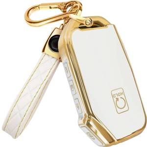 lot 4330 image: Lucrum for Kia Key Fob Cover and Leather Keychain - TPU Key Case for Kia Sportage, Soul, Forte, Telluride, EV6, Niro, K5, Stinger - 2018-2023 Keyfob Cover - White and Gold - Retail $13