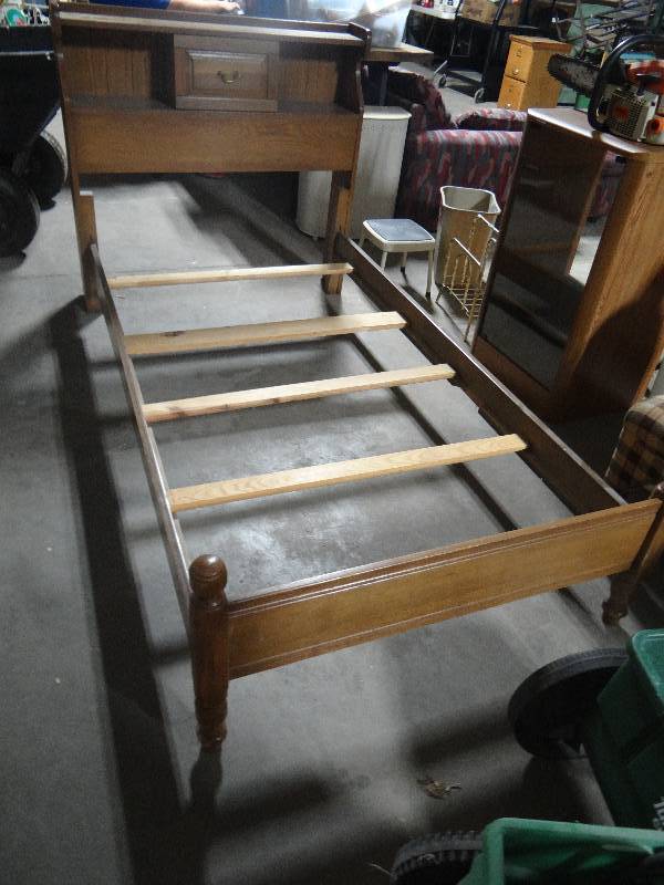 lot 4358 image: Twin size wooden bed frame.