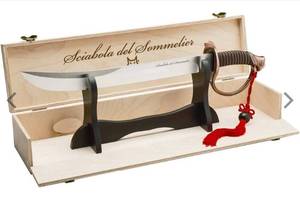 lot 10782 image: Fox Knives Maniago Italy Sciabola del Sommelier Saber Champagne Sabre, Stainless Steel Blade, Bronze Finish, Wooden Display Box-Retail-$199.99