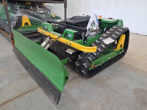lot 718 image: Remote Control Lawn Tractor with Snow Shovel by SD Launch (Unused)