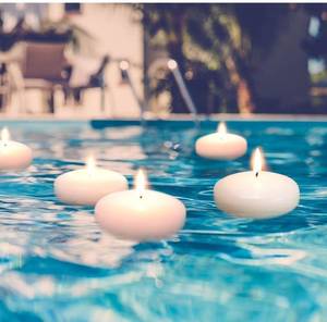 lot 31616 image: Tuyai (Set of 36) Floating Candles, 3 inch White Dripless Wax Burning Candles, for Weddings, Party, Special Occasions and Home Decorations