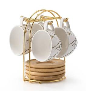 lot 31629 image: LUKA Ceramic Demitasse Espresso Cups Set with Saucers and Metal Stand, 8 oz Porcelain Stackable Cappuccino Cups Teacup For Tea, Espresso, Latte, Coffee, Cafe Mocha, Set of 4, White