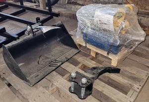 lot 5070 image: Unused 2025 Lot of Three (3) Mini Excavator Attachments -  Industrial-Grade Hydraulic BreakerHammer - Heavy Duty RipperShank -  60CM Toothless Mini Excavator Bucket