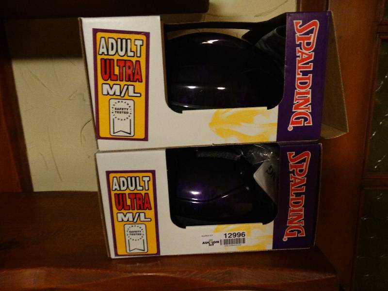 lot 12996 image: 2 Spalding bicycle helmets- New in box