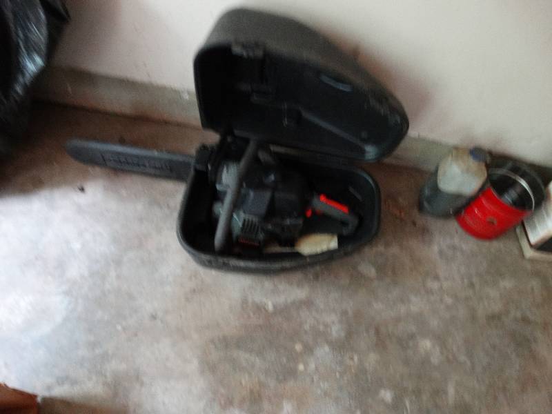 lot 13502 image: Craftsman gas power chain saw with case.