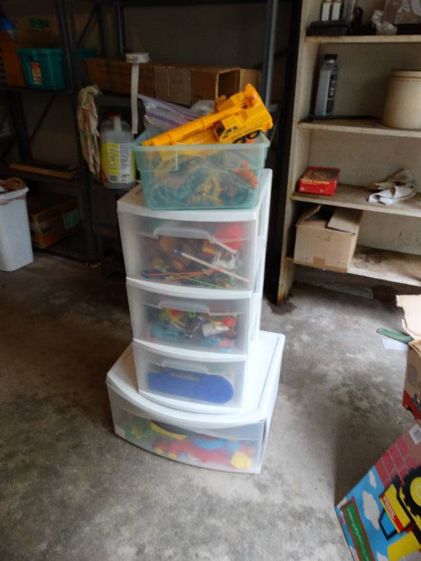 lot 13558 image: Plastic containers with contents, toys.
