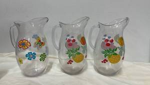 lot 5495 image: Vintage Tropical Glass Pitchers Set