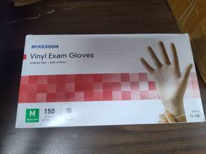 lot 8045 image: McKesson Vinyl Exam Gloves - Medium (150 Count)
