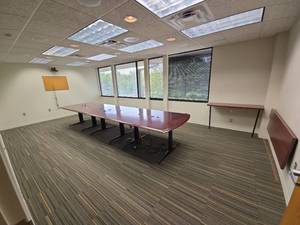 lot 13085 image: Contents of Room Including, Professional Conference Room Setup with Polycom Camera System
