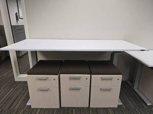 lot 20006 image: Standing Modern 5.10ft White Table and 3 Office File Cabinets with Cushioned Top