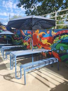 lot 49808 image: Modern Outdoor Dining Set with Umbrella