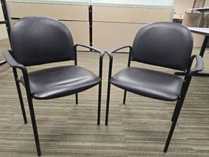 lot 49774 image: Black Office Guest Chair with Arms
