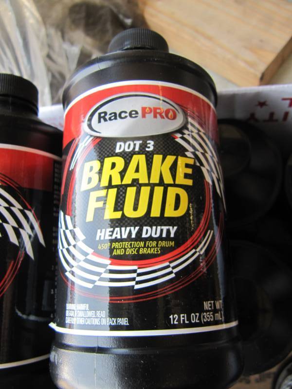 lot 246 image: CASE OF 12 NEW 12OZ RACE PRO HEAVY DUTY BRAKE FLUID