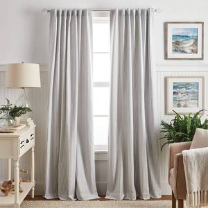 lot 7239 image: Martha Stewart 2pk 84 Ticking Stripe Back Tab Blackout Curtains