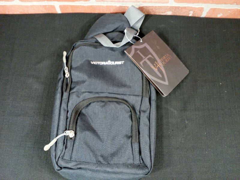 lot 48 image: Victoria Tourist Travel Sling Canvas Bag