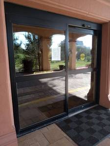 lot 6107 image: Commercial Automatic Door System with Access Control 94 34 x 89  - Retail $2500 - ITEM HALTED NO LONGER AVAILABLE