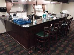 lot 9600 image: Commercial Bar Setup with Granite Top and Bar Stools approximately 16, 8, and 13 sections  - Retail $2500
