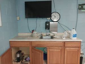 lot 9661 image: Kitchen Cabinet with sink, accessories & Sanyo Wall-Mounted TV with Mount  - Retail $75 ITEM HALTED NO LONGER AVALIABLE