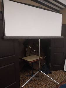 lot 9685 image: Portable Projection Screen with Stand and 60 Banquet Tables  - Retail $775