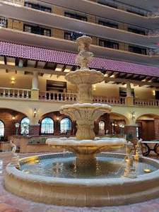 lot 6001 image: Formerly Embassy Suites Atrium Fountain - Mediterranean Style Indoor Fountain with Decorative Tiles 16ft diameter x 16ft tall   - Retail $30000