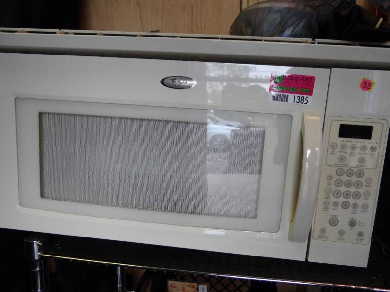 lot 1385 image: Whirlpool Over Oven Microwave With Built In Fan