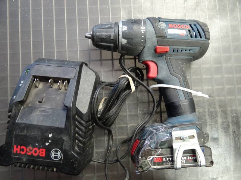 lot 1463 image: Bosch 14 Impact Drill with Charger