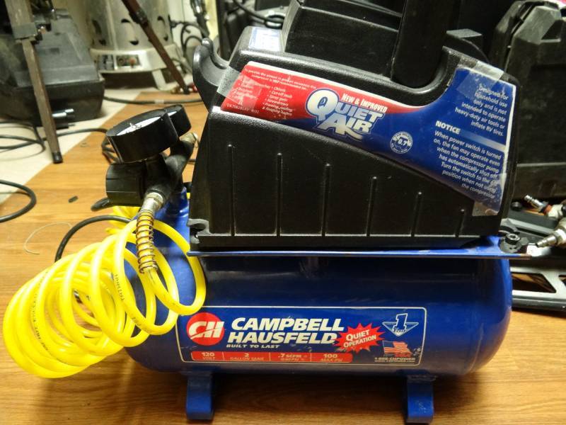 lot 7259 image: Campbell Hausfel 2 Gallon Portable Air Compressor