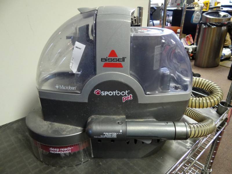 lot 7281 image: Bissell Pet Spot Bot Vacuum