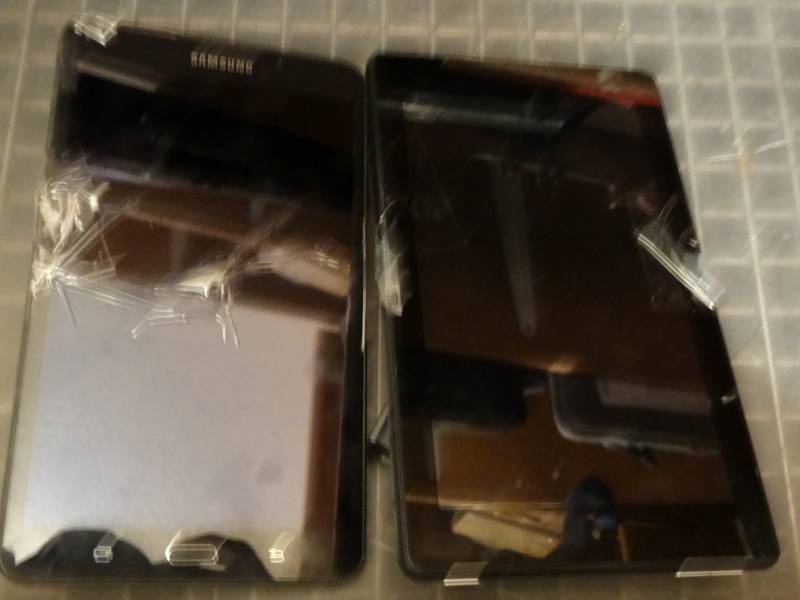 lot 7285 image: (2) 7 Tablets Samsung and Amazon with Power Cords