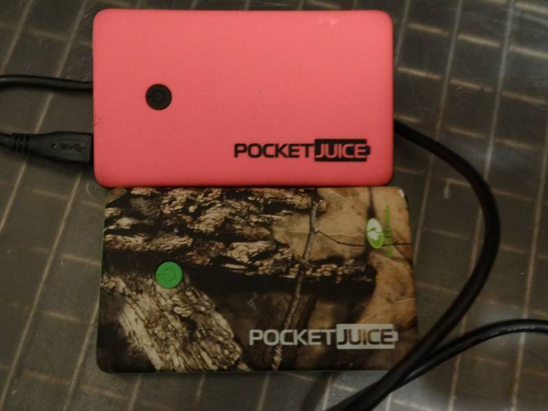lot 7287 image: Mossy Oak Pocket Juice and Pink Pocket Juice with Cord