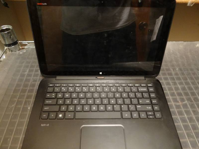 lot 7292 image: HP Split x2  (13) Laptop with Power Cord