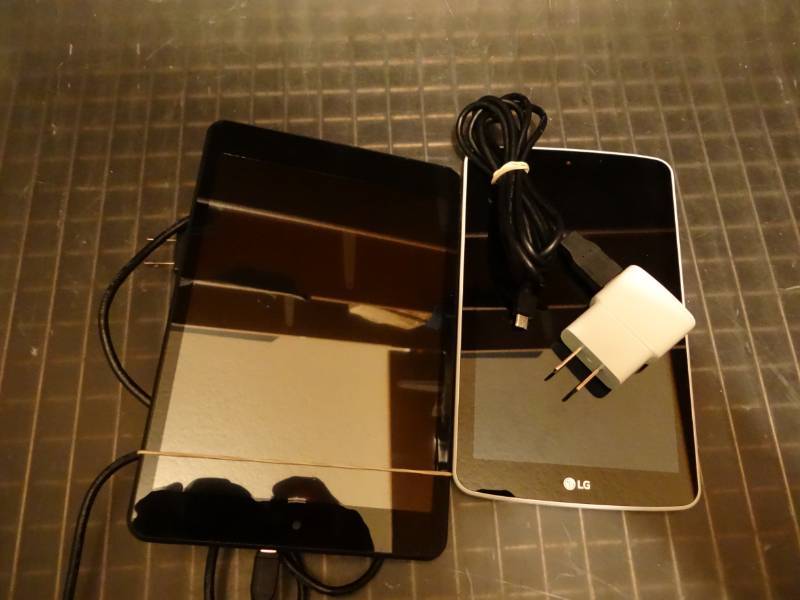 lot 7299 image: 7 RCA Tablet and 7 LG  Tablet Both Come with Power cord