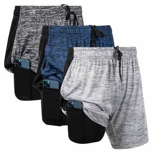lot 36482 image: Ultra Performance 3 Pack Mens 2 in 1 Athletic Running Shorts 7 inch Inseam Workout Gym Compression Shorts for Men Size L