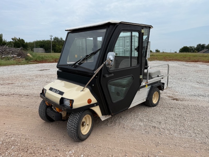 lot 1015A image: 2010 Electric Club Car Utility Cart with Full Cab and flip seat - titled in Oklahoma