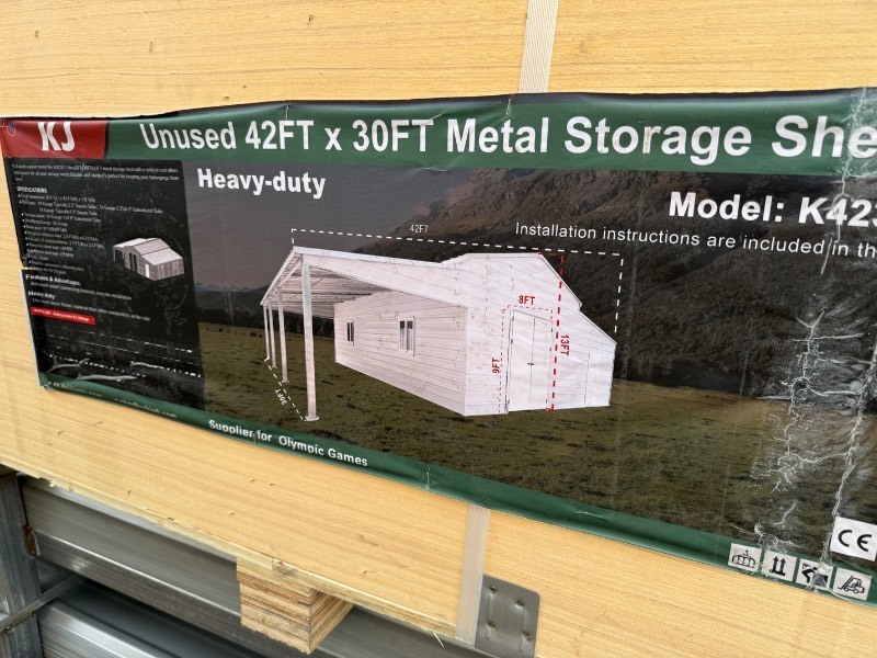 lot 1232 image: 30 x 42 x 13 Metal Storage Building with Leanto, Shop and Side Shed, Cream in Color