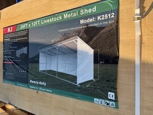 lot 1396 image: Unused 12 x 25 Metal LoafingLivestock Shed, Cream in Color