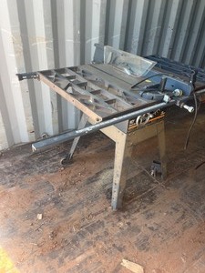 lot 1497 image: 3 HP 10 Table Saw with large guides and on wheels