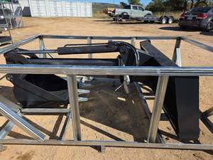 lot 10330 image: Unused 2025 JCT Skid Steer Backhoe Arm 14 Bucket