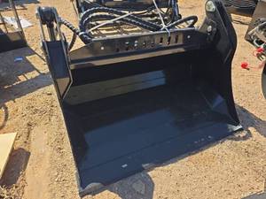 lot 10439 image: Mini Skid Steer 4-in-1 Bucket Attachment - Model XKH39