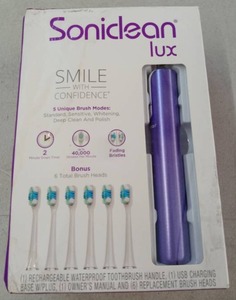 lot 57437 image: Soniclean Lux Electric Toothbrush Set with 6 Brush Heads - Retail $49