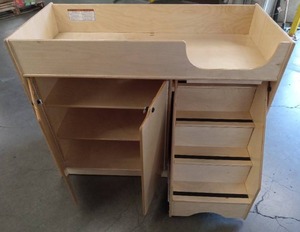lot 57476 image: Wooden Baby Changing Table with Storage - appears to need some tightening up of pieces - Retail $150