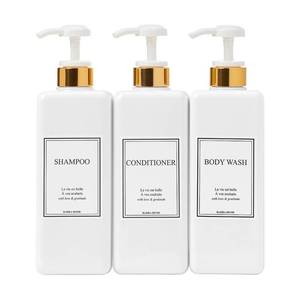 lot 15754 image: Modern Gold Design Large 27 oz Shampoo and Conditioner Dispensers - Empty Plastic Refillable Pump Bottle Set for Bathroom Shower Soap Dispenser, Set of 3 (White) - Retail $27