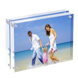 lot 16431 image: AMEITECH 5x7 Acrylic Photo Frame 2 Pack, Clear Magnetic Picture Frames, 10  10MM Thickness Stand in Desk or Table - Retail $23