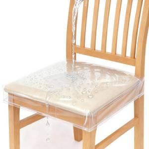 lot 20012 image: Zipcase 4 Pack Stain, Water and Kitty Scratch Resistant Clear Dining Chair CoversSlipcovers Chair Protector Waterproof PVC Material, 17�D x 18�W x 4�H with Adjustable Belt Strap, Set of 4 - Retail $25